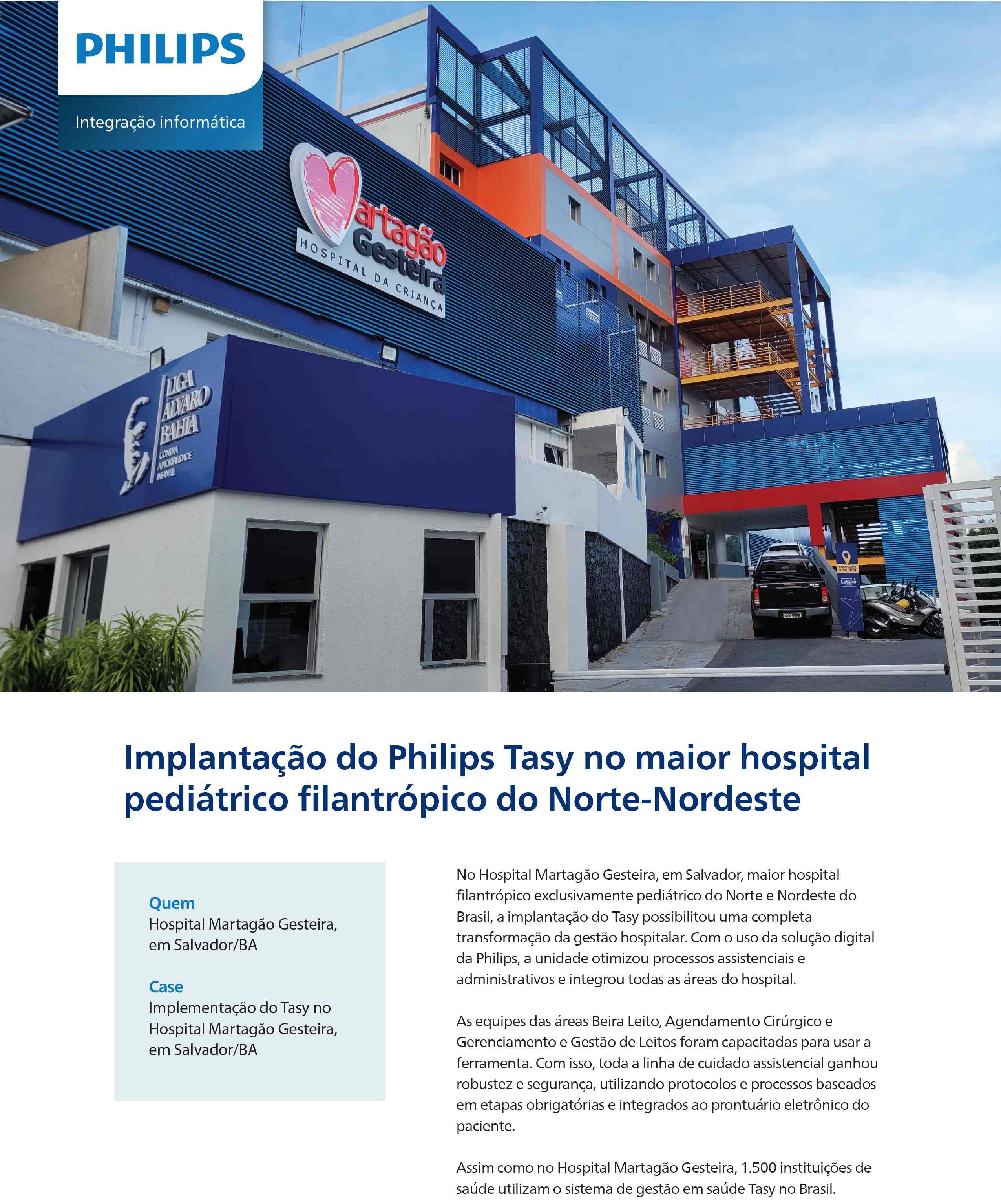 um edif&iacute;cio com telhado azul e laranja